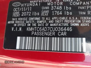 2012 Hyundai Veloster w/Gray Int z VIN KMHTC6AD7CU036446, wystawiony jako IAAI lot #42267057 z przebiegiem 110 564 mil mil oraz . Historia ofert i sprzedaży dostępna na DreamBid. Obrazek 9.