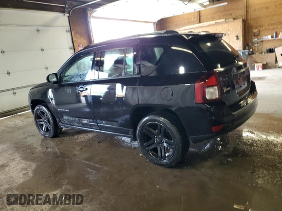 2016 Jeep Compass Sport with VIN 1C4NJDBBXGD598240, listed as a Copart auction lot 57887495 with 152,932 mi miles and Salvage title. Bid and sale history available at DreamBid. Image 2.