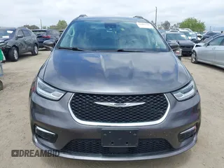 2022 Chrysler Pacifica Touring L z VIN 2C4RC1BG0NR134194, wystawiony jako IAAI lot #42082795 z przebiegiem 98 845 mil mil oraz . Historia ofert i sprzedaży dostępna na DreamBid. Obrazek 13.