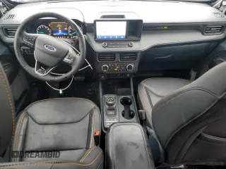 2023 Ford Maverick z VIN 3FTTW8G94PRA99298, wystawiony jako Copart lot #47267125 z przebiegiem 12 560 mil mil oraz Szkoda całkowita • Salvage title. Historia ofert i sprzedaży dostępna na DreamBid. Obrazek 8.