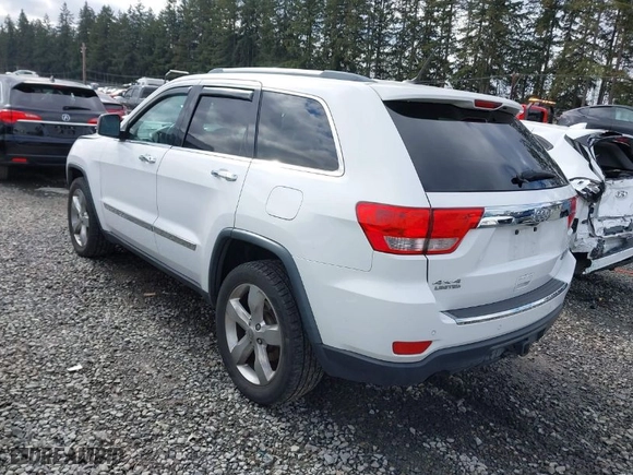 2013 Jeep Grand Cherokee Limited with VIN 1C4RJFBT0DC619216, listed as a IAAI auction lot 41703137 with 142,577 mi miles. Bid and sale history available at carsss.com. Image 3.