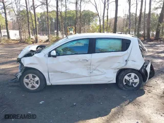 2014 Chevrolet Sonic LS with VIN 1G1JA6SH1E4128568, listed as a IAAI auction lot 41801552 with 151,284 mi miles. Bid and sale history available at carsss.com. Image 14.