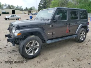 2020 Jeep Wrangler Unlimited Sahara with VIN 1C4HJXEN2LW149623, listed as a Copart auction lot 50906705 with 71,919 mi miles and Salvage title. Bid and sale history available at DreamBid. Image 1.
