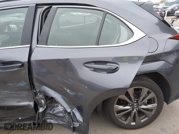 2023 Lexus UX 250h F Sport z VIN JTHB6JBH9P2132431, wystawiony jako IAAI lot #42137625 z przebiegiem 15 923 mil mil oraz . Historia ofert i sprzedaży dostępna na DreamBid. Obrazek 17.