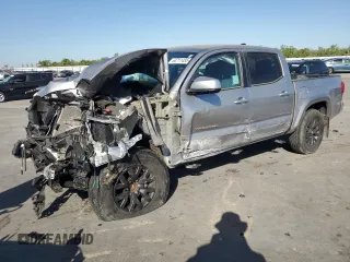 2021 Toyota Tacoma SR5 with VIN 5TFAZ5CN1MX118909, listed as a Copart auction lot 63711485 with 24,402 mi miles and Salvage title. Bid and sale history available at DreamBid. Image 1.
