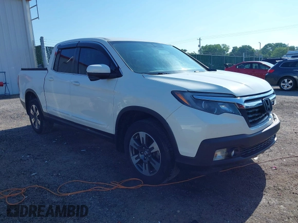 2017 Honda Ridgeline RTL-T z VIN 5FPYK3F69HB038048, wystawiony jako IAAI lot #42583177 z przebiegiem 183 564 mil mil oraz . Historia ofert i sprzedaży dostępna na DreamBid. Obrazek 1.