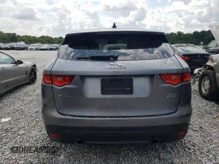 2020 Jaguar F-Pace 25t Premium z VIN SADCJ2FX2LA622614, wystawiony jako Copart lot #61855884 z przebiegiem 116 046 mil mil oraz Szkody całkowita. Historia ofert i sprzedaży dostępna na DreamBid. Obrazek 6.
