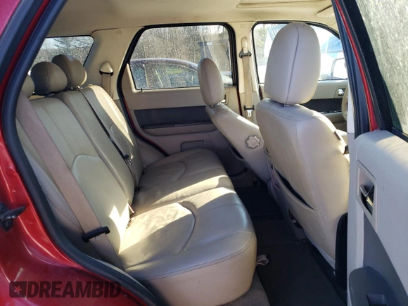 2009 Mercury Mariner Premier z VIN 4M2CU97G59KJ05976, wystawiony jako Copart lot #45646445 z przebiegiem 167 041 mil mil oraz Czysty tytuł • Clean title. Historia ofert i sprzedaży dostępna na DreamBid. Obrazek 11.