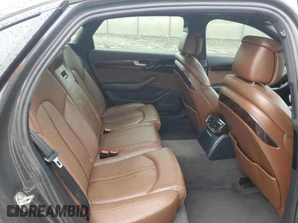 2017 Audi A8 z VIN WAU44AFD0HN004258, wystawiony jako Copart lot #55283985 z przebiegiem 128 059 mil mil oraz Szkoda całkowita • Salvage title. Historia ofert i sprzedaży dostępna na DreamBid. Obrazek 10.