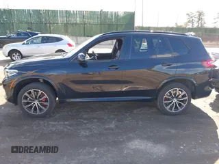 2021 BMW X5 xDrive40i with VIN 5UXCR6C01M9F47234, listed as a IAAI auction lot 41564014 with 42,874 mi miles. Bid and sale history available at carsss.com. Image 14.