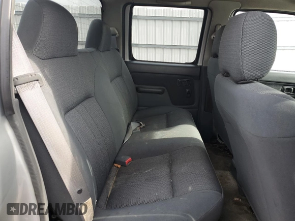 2004 Nissan Frontier XE with VIN 1N6ED29X94C415650, listed as a Copart auction lot 42880085 with 148,907 mi miles and Salvage title. Bid and sale history available at DreamBid. Image 11.