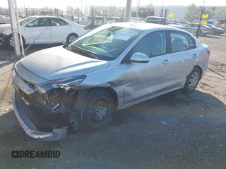 2023 Kia Rio LX with VIN 3KPA24AD1PE599290, listed as a IAAI auction lot 41023283 with 10,027 mi miles and . Bid and sale history available at DreamBid. Image 17.