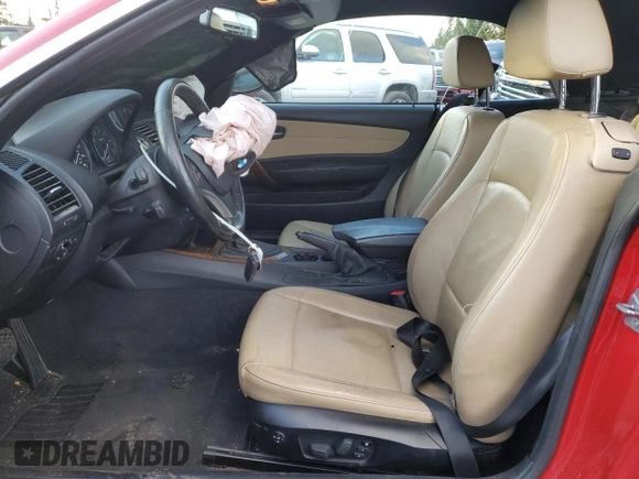 2010 BMW 1 Series 128i with VIN WBAUL7C54AVJ77712, listed as a Copart auction lot 83158294 with Not provided miles and Salvage title. Bid and sale history available at DreamBid. Image 7.