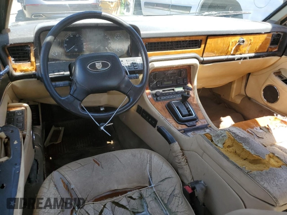 1990 Jaguar XJ with VIN SAJKY1745LC622713, listed as a Copart auction lot 56545414 with Not Provided miles and Salvage Title. Bid and sale history available at DreamBid. Image 8.