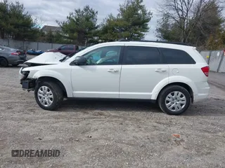 2016 Dodge Journey SE with VIN 3C4PDCAB1GT104630, listed as a IAAI auction lot 41731485 with 233,992 mi miles. Bid and sale history available at carsss.com. Image 13.