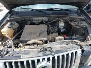 2011 Mercury Mariner Premier with VIN 4M2CN8HGXBKJ07489, listed as a IAAI auction lot 42574942 with 163,786 mi miles and . Bid and sale history available at DreamBid. Image 10.