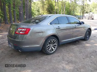 2013 Ford Taurus Limited z VIN 1FAHP2F81DG225389, wystawiony jako IAAI lot #42429969 z przebiegiem 241 874 mil mil oraz . Historia ofert i sprzedaży dostępna na DreamBid. Obrazek 4.