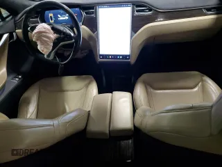2015 Tesla Model S 85D with VIN 5YJSA1H24FF092628, listed as a Copart auction lot 51959035 with 128,744 mi miles and Salvage Title. Bid and sale history available at carsss.com. Image 8.