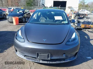 2022 Tesla Model 3 Long Range with VIN 5YJ3E1EB0NF365284, listed as a IAAI auction lot 41899706 with 36,463 mi miles and . Bid and sale history available at DreamBid. Image 13.