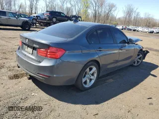 2013 BMW 3 Series 328i xDrive with VIN WBA3B5G52DNS01975, listed as a Copart auction lot 53555725 with 165,248 mi miles and Salvage Title. Bid and sale history available at carsss.com. Image 3.