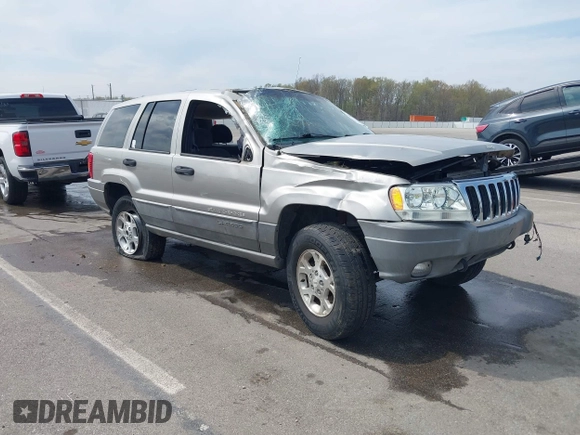 2000 Jeep Grand Cherokee Laredo with VIN 1J4GW48N5YC322707, listed as a IAAI auction lot 42080677 with Not provided miles and . Bid and sale history available at DreamBid. Image 1.