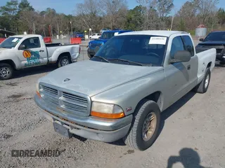 2000 Dodge Dakota with VIN 1B7GL22XXYS577744, listed as a IAAI auction lot 41509241 with 163,054 mi miles. Bid and sale history available at carsss.com. Image 6.