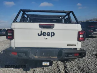 2021 Jeep Gladiator Freedom z VIN 1C6HJTAGXML557586, wystawiony jako Copart lot #43510795 z przebiegiem Nie podano mil oraz Szkoda całkowita • Salvage title. Historia ofert i sprzedaży dostępna na DreamBid. Obrazek 6.