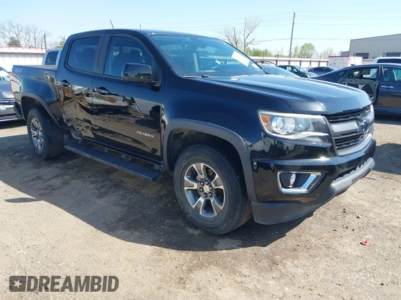 2018 Chevrolet Colorado 4WD Z71 z VIN 1GCGTDEN0J1173420, wystawiony jako IAAI lot #41971813 z przebiegiem 98 499 mil mil oraz . Historia ofert i sprzedaży dostępna na DreamBid. Obrazek 1.