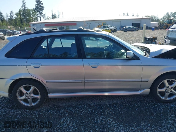 2002 Mazda Protege z VIN JM1BJ246221493337, wystawiony jako IAAI lot #42171966 z przebiegiem 244 609 mil mil oraz . Historia ofert i sprzedaży dostępna na DreamBid. Obrazek 13.