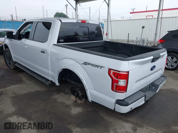 2019 Ford F-150 XL with VIN 1FTEW1CPXKKC50999, listed as a IAAI auction lot 41862139 with 61,375 mi miles and . Bid and sale history available at DreamBid. Image 3.