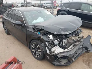 2023 Honda Civic Sedan EX with VIN 2HGFE1F72PH316934, listed as a IAAI auction lot 41538109 with 43,746 mi miles. Bid and sale history available at carsss.com. Image 1.