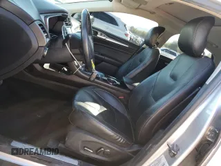 2013 Ford Fusion Titanium Hybrid with VIN 3FA6P0RU5DR321121, listed as a Copart auction lot 77019974 with 160,361 mi miles and Salvage Title. Bid and sale history available at DreamBid. Image 7.