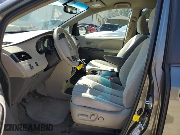 2012 Toyota Sienna LE AAS with VIN 5TDKK3DC0CS274812, listed as a Copart auction lot 49767715 with 124,699 mi miles and Salvage Title. Bid and sale history available at carsss.com. Image 7.