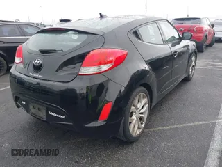 2013 Hyundai Veloster w/Gray Int with VIN KMHTC6AD6DU172892, listed as a IAAI auction lot 41518462 with 167,251 mi miles. Bid and sale history available at carsss.com. Image 4.