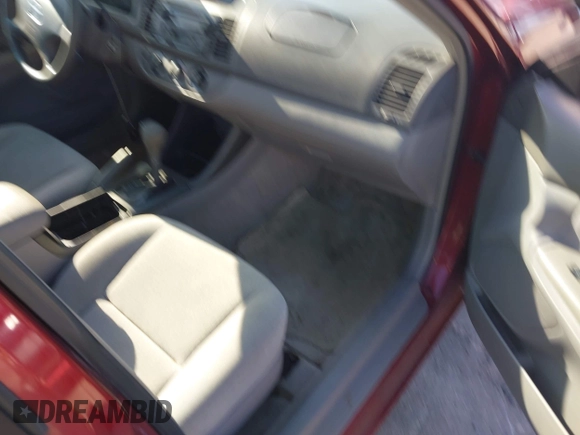 2004 Toyota Camry LE with VIN 4T1BE32KX4U272768, listed as a IAAI auction lot 42006421 with 204,386 mi miles. Bid and sale history available at carsss.com. Image 5.