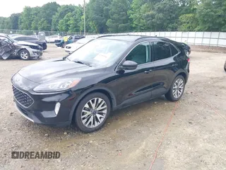 2021 Ford Escape Titanium Hybrid z VIN 1FMCU0DZ0MUA16798, wystawiony jako IAAI lot #42502086 z przebiegiem 107 250 mil mil oraz . Historia ofert i sprzedaży dostępna na DreamBid. Obrazek 17.