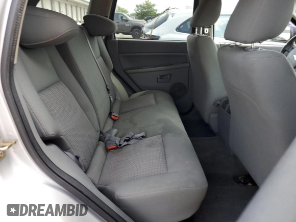 2007 Jeep Grand Cherokee Laredo with VIN 1J8GS48K77C575560, listed as a Copart auction lot 65741354 with 150,062 mi miles and Salvage Title. Bid and sale history available at carsss.com. Image 12.