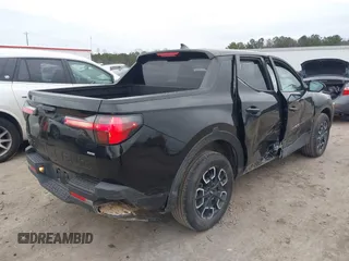 2022 Hyundai Santa Cruz SEL z VIN 5NTJBDAE5NH008011, wystawiony jako IAAI lot #41614699 z przebiegiem 57 484 mil mil oraz . Historia ofert i sprzedaży dostępna na DreamBid. Obrazek 4.