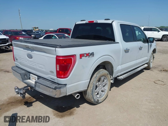 2021 Ford F-150 XL z VIN 1FTFW1E86MKD90402, wystawiony jako IAAI lot #42007680 z przebiegiem 103 724 mil mil oraz . Historia ofert i sprzedaży dostępna na DreamBid. Obrazek 4.