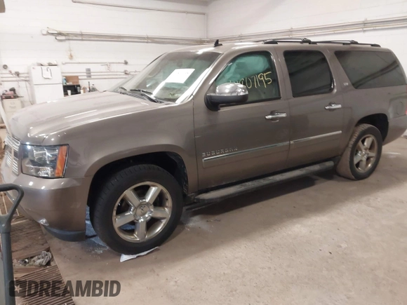 2012 Chevrolet Suburban LTZ with VIN 1GNSKKE79CR180400, listed as a IAAI auction lot 41807195 with 154,410 mi miles and . Bid and sale history available at carsss.com. Image 2.
