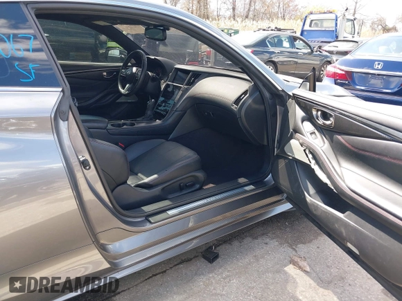 2021 Infiniti Q60 Red Sport 400 with VIN JN1FV7LLXMM560314, listed as a IAAI auction lot 41930067 with 47,818 mi miles and . Bid and sale history available at DreamBid. Image 5.