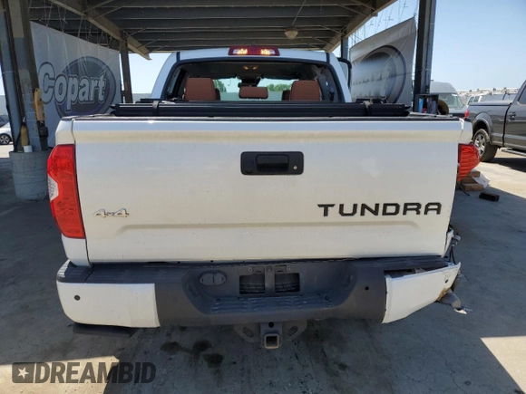 2021 Toyota Tundra Platinum z VIN 5TFAY5F14MX963197, wystawiony jako Copart lot #56002725 z przebiegiem 84 941 mil mil oraz Szkoda całkowita • Salvage title. Historia ofert i sprzedaży dostępna na DreamBid. Obrazek 6.