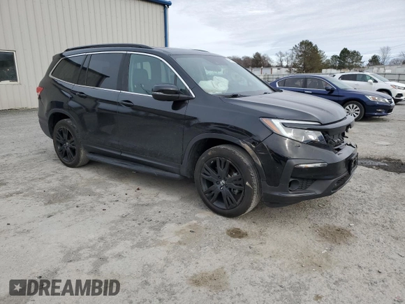 2021 Honda Pilot Special Edition with VIN 5FNYF6H24MB029437, listed as a Copart auction lot 48829155 with 60,875 mi miles and Salvage Title. Bid and sale history available at DreamBid. Image 4.