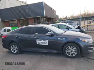 2017 Kia Optima LX with VIN 5XXGT4L32HG156845, listed as a IAAI auction lot 41402224 with 126,529 mi miles. Bid and sale history available at carsss.com. Image 13.