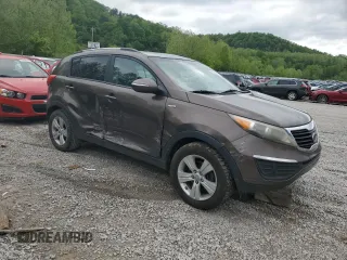 2011 Kia Sportage LX z VIN KNDPBCA24B7057936, wystawiony jako Copart lot #55645095 z przebiegiem 152 923 mil mil oraz Szkoda całkowita • Salvage title. Historia ofert i sprzedaży dostępna na DreamBid. Obrazek 4.