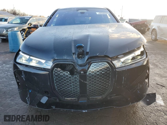 2025 BMW iX xDrive50 with VIN WB523CF0XSCT63136, listed as a Copart auction lot 44538265 with 230 mi miles and Salvage Title. Bid and sale history available at carsss.com. Image 5.