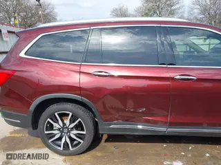 2019 Honda Pilot Touring 8-Passenger with VIN 5FNYF5H95KB009122, listed as a IAAI auction lot 41573338 with 85,845 mi miles. Bid and sale history available at carsss.com. Image 20.