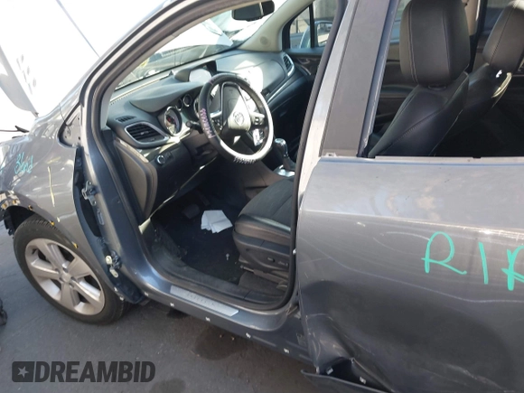 2015 Buick Encore with VIN KL4CJASB3FB168155, listed as a IAAI auction lot 41861563 with 57,574 mi miles. Bid and sale history available at carsss.com. Image 6.