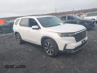 2025 Honda Pilot Touring с VIN 5FNYG1H76SB014396, выставлен на аукционе IAAI как лот 41823890 с пробегом 13 657 миль миль и . История ставок и продаж доступна на DreamBid. Изображение 1.