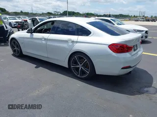 2018 BMW 4 Series 430i with VIN WBA4J1C5XJBG78451, listed as a IAAI auction lot 42256036 with 103,289 mi miles and . Bid and sale history available at DreamBid. Image 3.